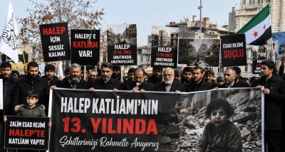 Esed rejiminin Halep'te işlediği katliamın 13. yılında Lanetlendi